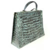 Grande sculpture sac Kelly en cuivre martelé (3/4 dos)