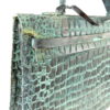 Grande sculpture sac Kelly en cuivre martelé (détail 3/4)