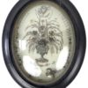 Grand reliquaire en cheveux et encre dans son cadre Napoléon III (face)