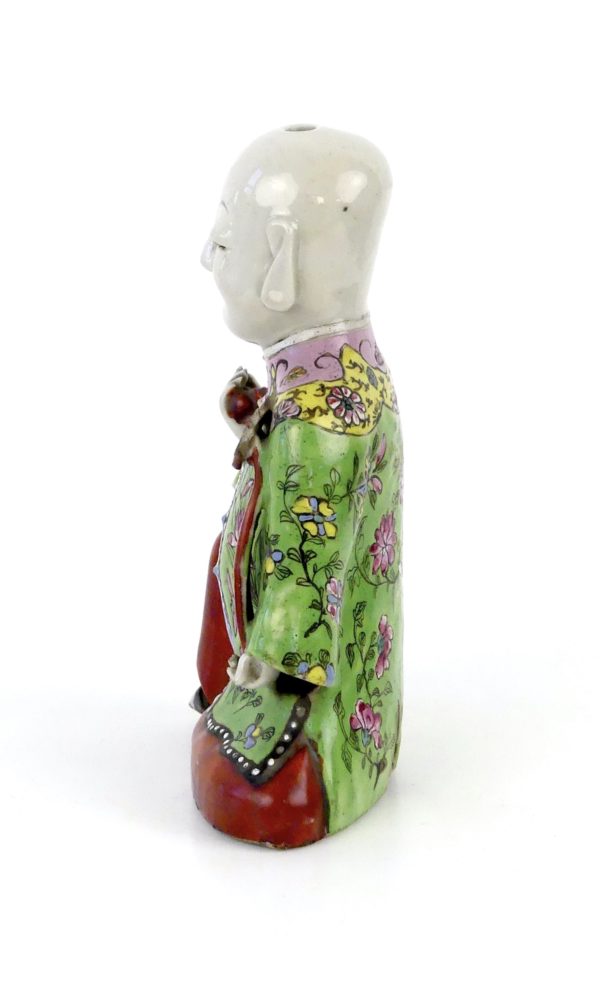 Porcelaine de dignitaire rieur dynastie Qing (profil)