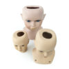 3 têtes de poupée en porcelaine biscuit mi-XXe (dessus)