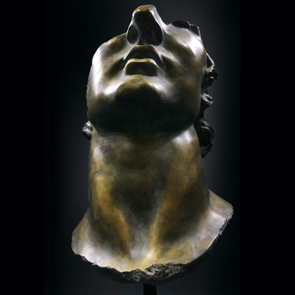 Grand fragment tête d’Apollon moulé à patine bronze sur pied métallique (dessous face)