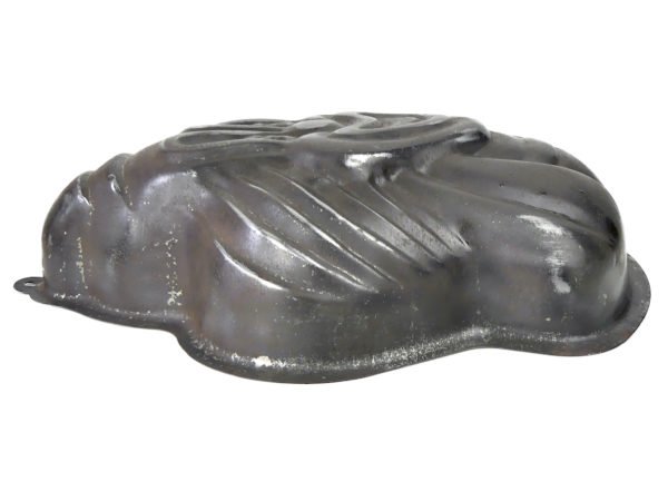 Moule à chocolat Clown en fer-blanc France Mi-XXe (profil)