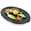 Petit plat ovale Vallauris barbotine noire poissons et coquillages Années 60 (3/4)