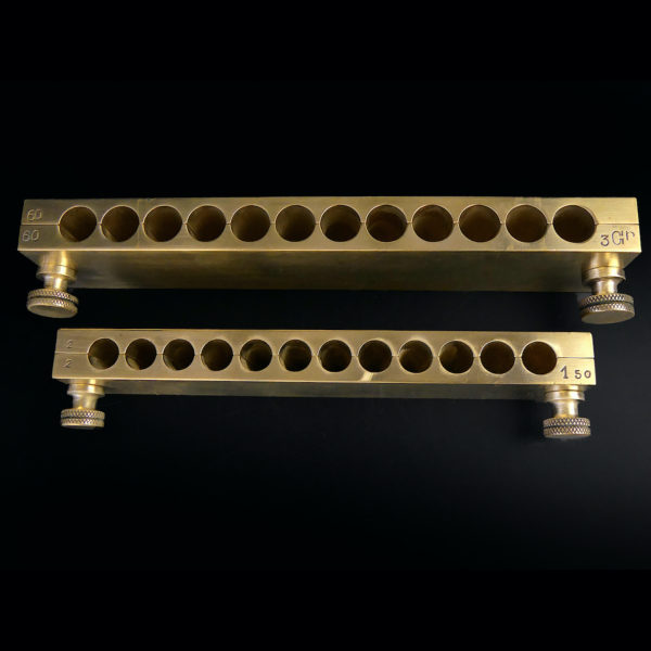 2 moules à ovules anciens de pharmacie en bronze (tranches)